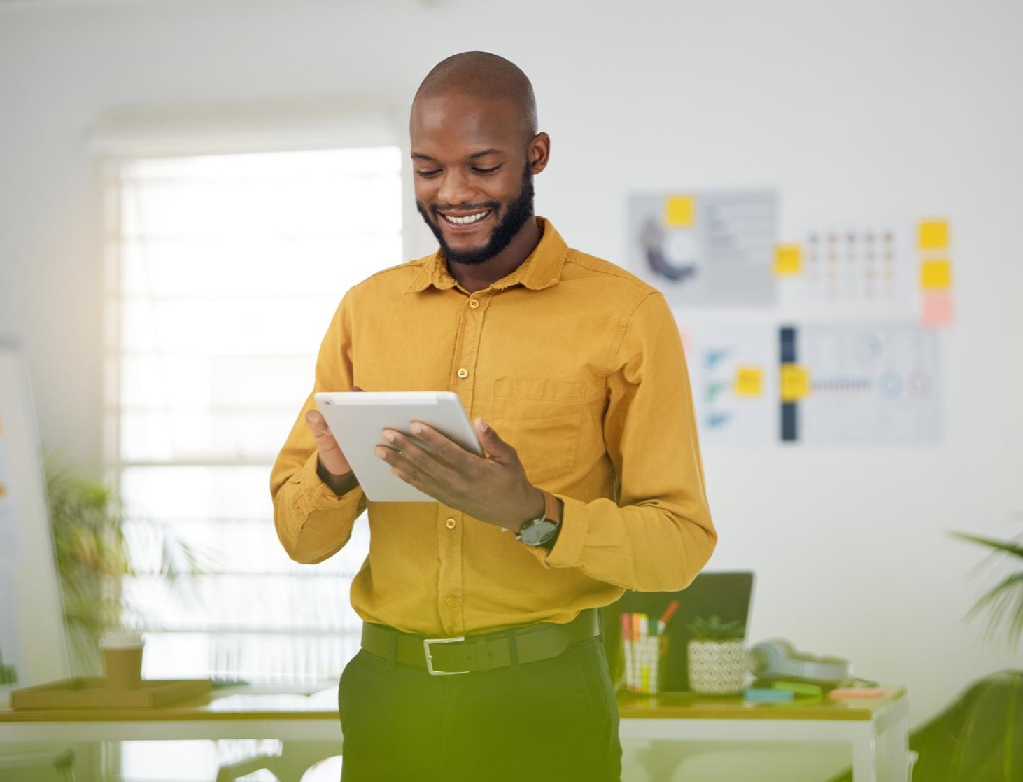 A member of the Ardent Africa community using the platform on a tablet